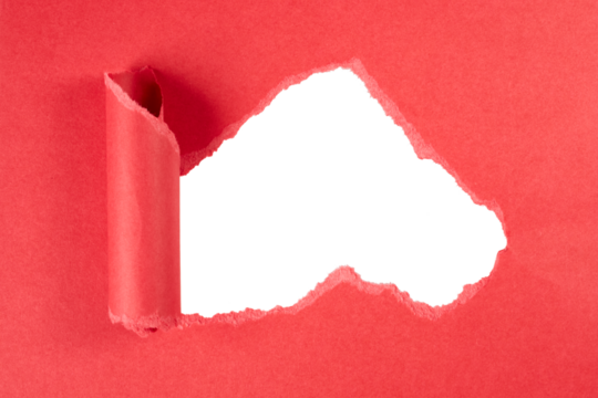 ripped hole in red paper with rolled edge isolated on white or transparent png