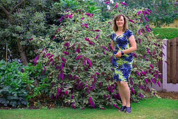 Standing beside the variegated buddleia.