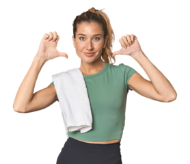 Young Caucasian female athlete in studio feels proud and self confident, example to follow.