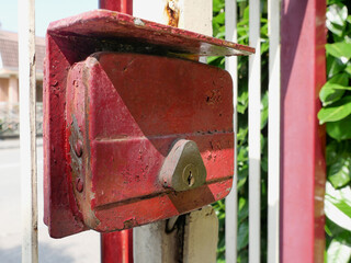 weathered iron gate lock