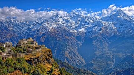 Mountainous Scenery With Snowcapped Peaks And Village