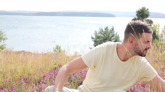Man reading in stunning natural setting 