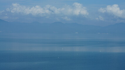 The beautiful countryside view with the clear river and mountains as background in the countryside of the China