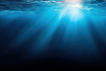 blue background with deep underwater water in sea and sunbeams on surface with ripples