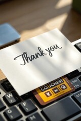 Handwritten Thank-You Card and Coffee Shop Voucher on a Desk