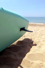 Afternoon enjoyment on a sub board in the clear and turquoise sea. Man Relaxing on a SUP in Crystal...
