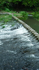 The little waterfall view in the countryside after the rainy day