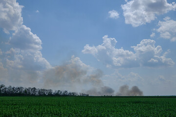 fire and smoke on the field