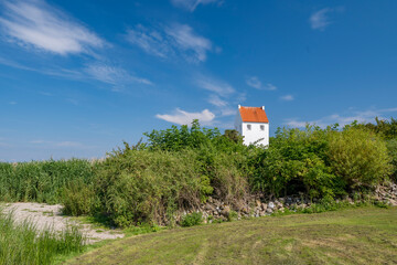 Obraz premium Typical Danish old white-tiled church