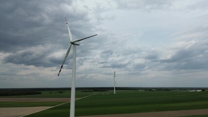 Fototapeta premium Wind turbine blades turning with motion