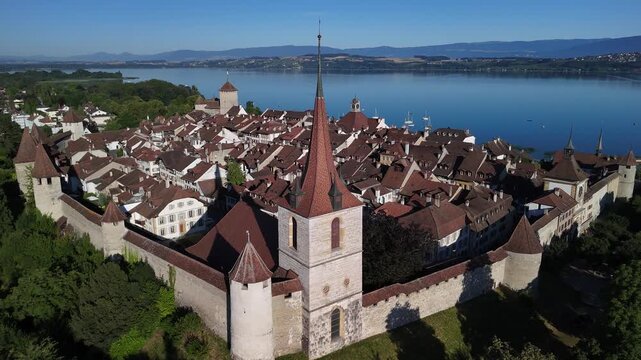 Murten lake Morat medieval old town fortification walls Switzerland aerial drone