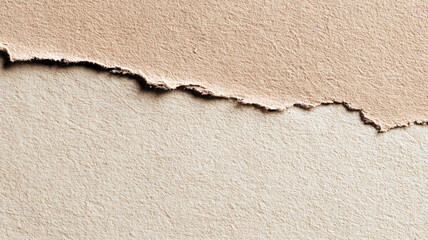 Close-up of torn kraft paper with rough edges. Natural beige texture ideal for backgrounds, eco design, scrapbooking, packaging, or handmade crafts