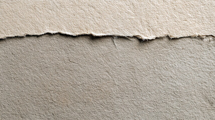 Close-up of torn kraft paper with rough edges. Natural beige texture ideal for backgrounds, eco design, scrapbooking, packaging, or handmade crafts