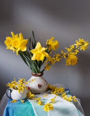 A stunning display of vibrant yellow flowers beautifully arranged in a vintage pitcher