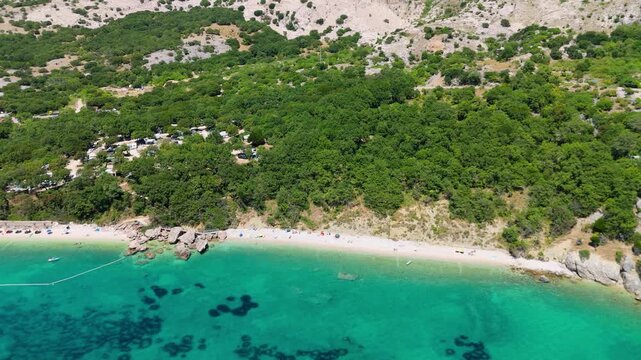 Campsite at Campig Skrila, Krk Island, Stara Baska Croatia, Aerial View of the Mountains and Coast With Boats, Beaches and Adriatic Sea. The Seaside Rv Campmobiles on a Summer Beautiful Coastline