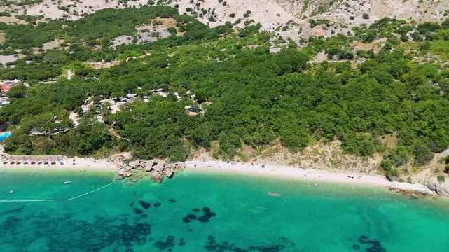 Campsite at Campig Skrila, Krk Island, Stara Baska Croatia, Aerial View of the Mountains and Coast With Boats, Beaches and Adriatic Sea. The Seaside Rv Campmobiles on a Summer Beautiful Coastline