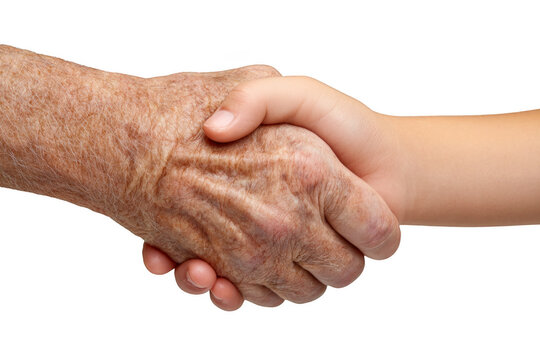 A handshake between an elderly man and a young boy