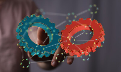 Image of two gears meshing, symbolizing teamwork, collaboration, and synergy in business.