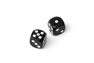 Two old black dice isolated on white background.