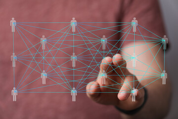 Image of a hand interacting with a digital network of interconnected people, symbolizing global...