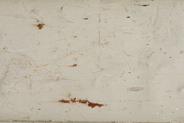 High-resolution image of a rustic beige wood surface with scratches and rust. Perfect for backgrounds and textures.