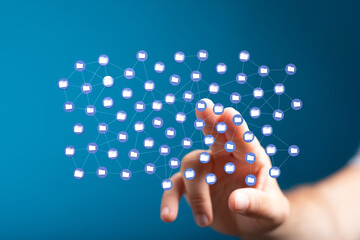 Hand interacting with a digital network of files.  Cloud storage, data management.