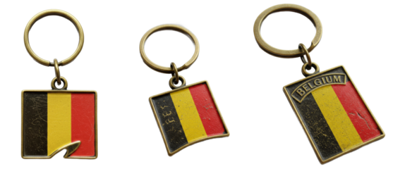 Collection of Belgian flag keychains in vintage brass finish on white backdrop