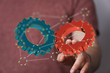 Image of two gears working together, symbolizing teamwork, cooperation, and efficiency.