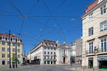 Church and tram wires in Lisbon street