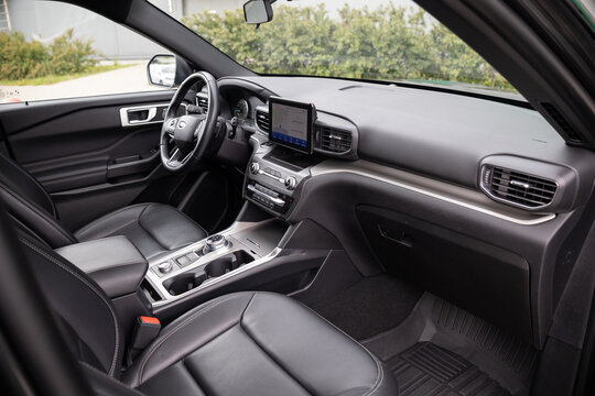 interior of a car Ford Explorer SUV XLT detail logo car on the road detail logo