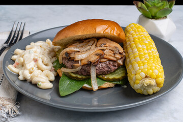 onion and mushroom burger  on a brioche bun