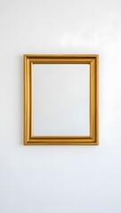 Elegant gold frame hanging on white wall perfect for art display and home decoration