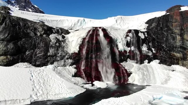 Blood Falls Flowing, Antarctica. Glacial Ice and Mountain Landscape Background. Science Imagery