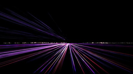 Abstract design of a highway at night, with streaks of light.