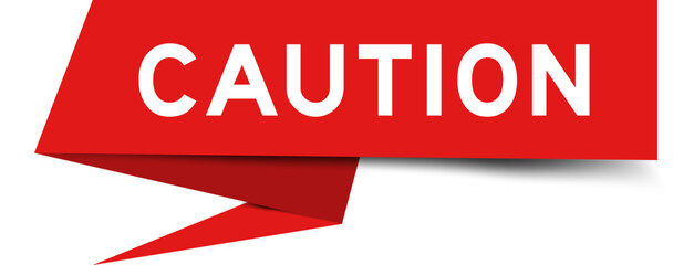 Red color speech banner with word caution on white background