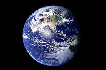 The planet earth seen from space against the dark background