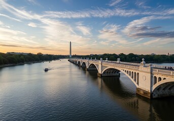 穏やかな朝焼け、静かに流れる川に映る白い橋の美しい風景