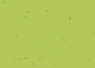 Abstract pattern of small gray dots scattered on a light green background