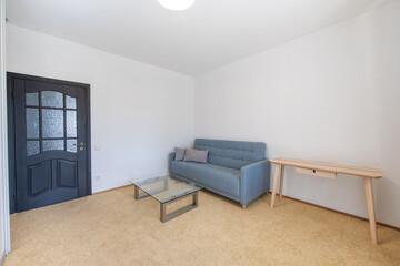 Minimalism Children, Young Adult Living Room Interior. Couch and Table.