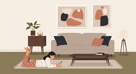Young Woman Enjoying Digital Media On Her Mobile Device In Cozy Home Setting