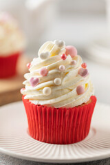 Red velvet cupcakes with whipped cream for Holidays