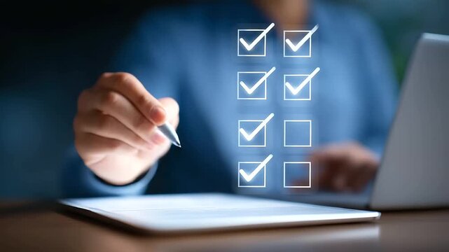 A hand with a stylus marks items on a digital checklist.