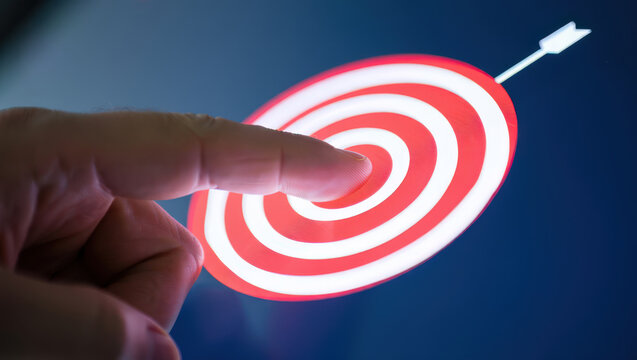 Interactive Target Practice A Finger Tapping a Digital Bullseye on a Touchscreen Displaying Precision and Accuracy in Modern Technology and Gaming