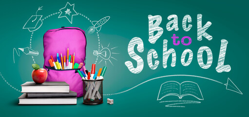 A back to school scene of a pile of three study books to learn from, a red apple, pink school bag and pens and pencils against a green chalkboard background with doodles and copy space.