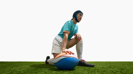 Woman rugby player kneeling on field with rugby ball against white backdrop. Concept of grounded stance, possession strategy, defensive focus