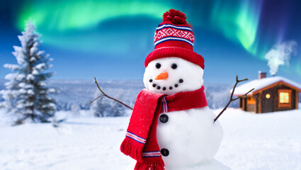 Obraz premium Snowman wearing a red hat and scarf