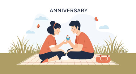 Lovely Couple Enjoying Picnic Together Celebrating Anniversary With Cupcake