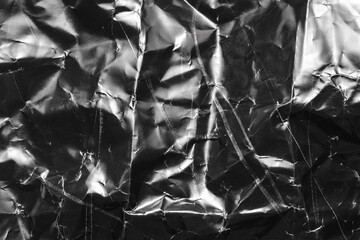 retro film overlay effect with scratch dust and light leaks,grunge retro grain noisy film distressed texture light leak flare on black background,black and white crumpled paper