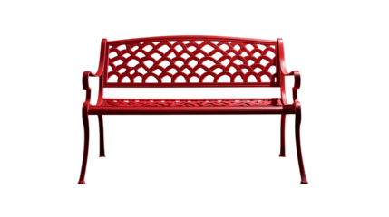 A red metal park bench with decorative backrest isolated on black background