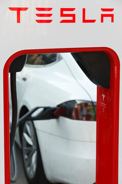 Berlin, Germany 09-17-2020 Outdoor Tesla electric car charging battery in public charging station &ldquo;Superchargers&rdquo;